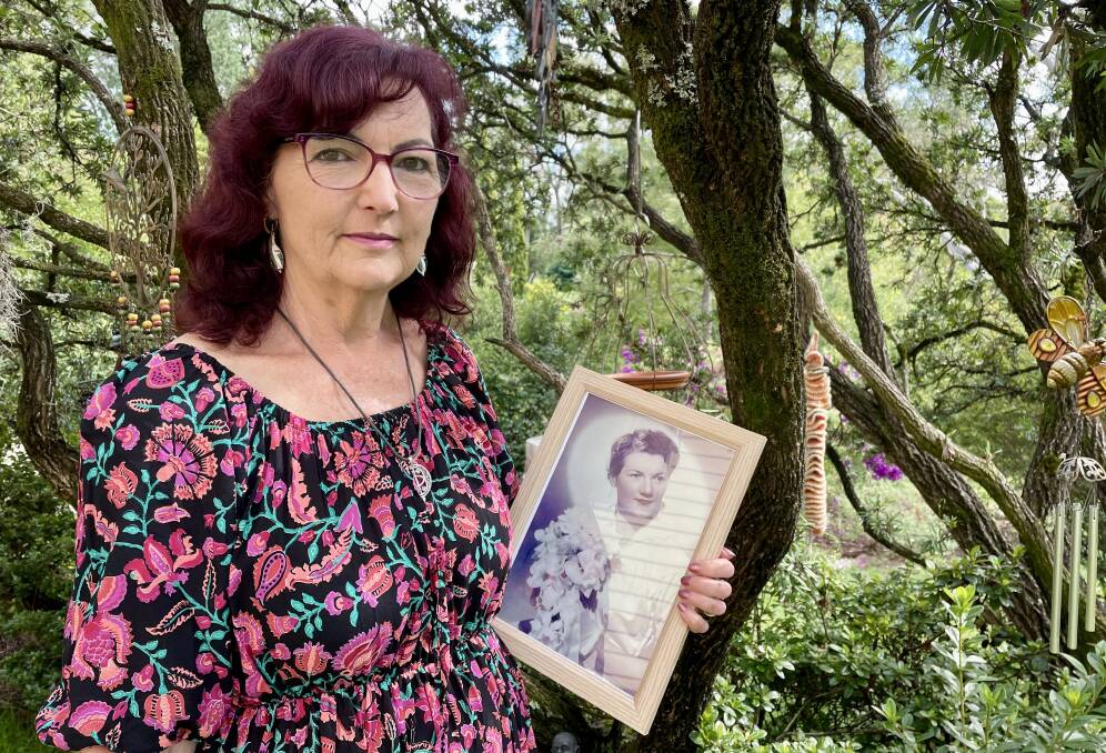 Lorraine Doyle with a photograph of her late mother, Lola Hope Dickson.