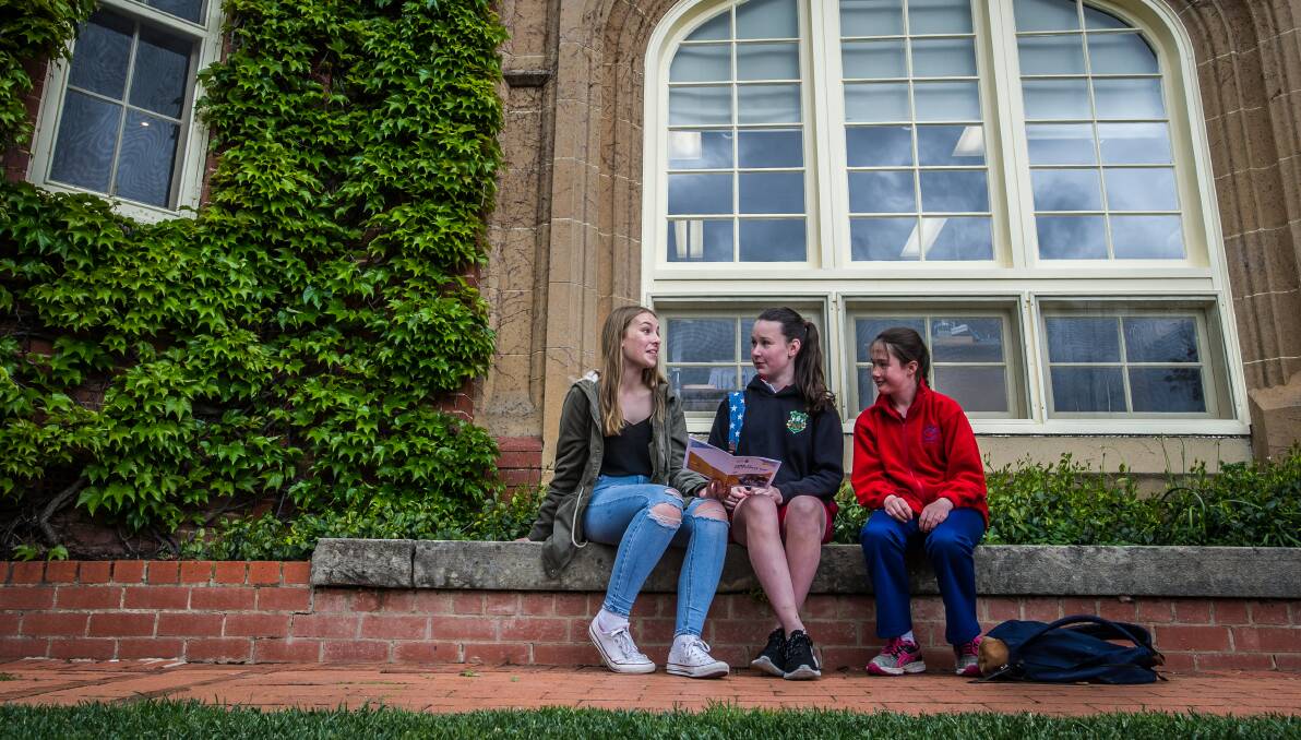 FIRST INTAKE: The first female students on Canberra Boys Grammar School campus in preparation for 2017. (from left) Annabelle Lester (year 11), Charlize king, (year 7) and Frida Meares (year 7) . Photo: Karleen Minney