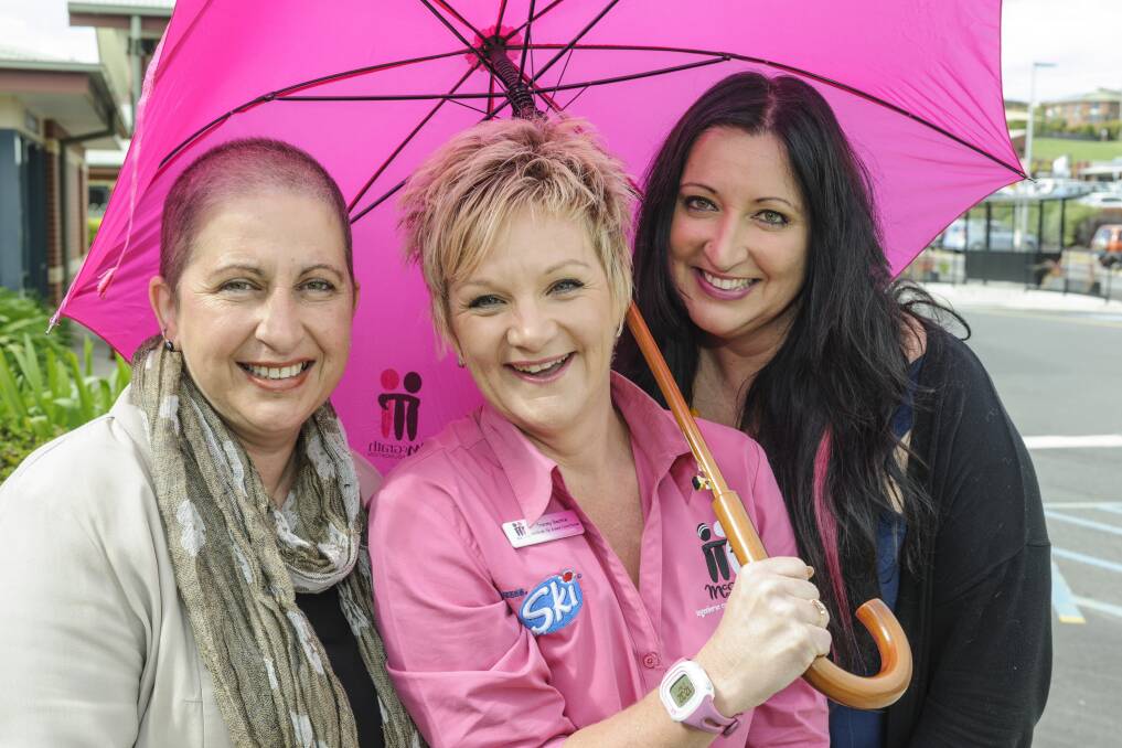 PINK IT UP: New South Wales Breast Care Nurse Tracey Beattie with Marina and Giovanna brightening up their town.