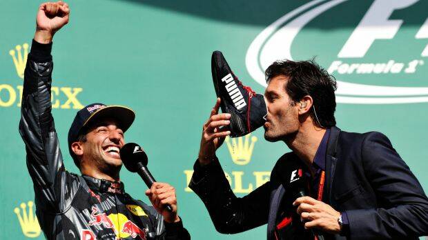 Mark Webber was interviewing Daniel Ricciardo at Belgian Grand Prix in August when he was offered champagne from Ricciardo's racing boot. Photo: Getty Images
