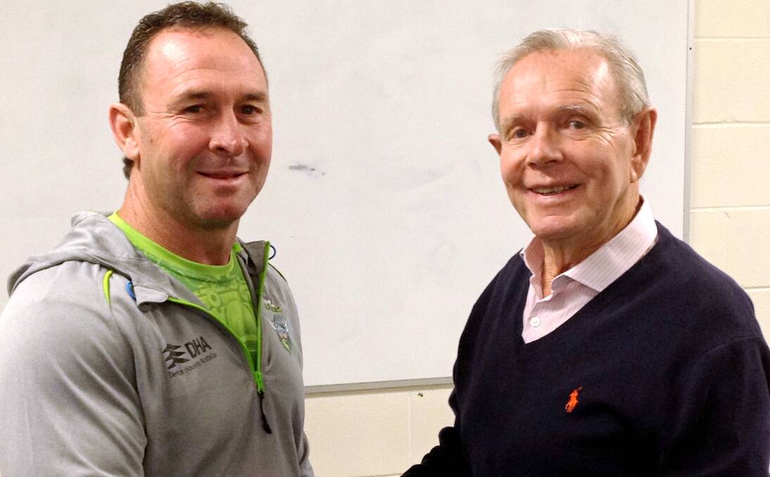 RAISING MONEY: Canberra Raiders coach Ricky Stuart with Queanbeyan Arts Society president Barry Cranston. The art show will raise money for the Ricky Stuart Foundation to help support children with autism and their families.