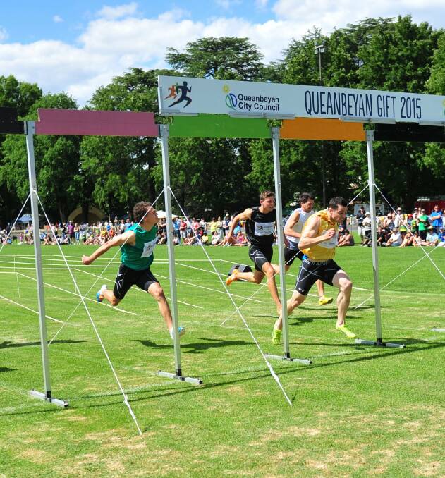 GIVING IT THEIR ALL: The men's 120m at the Queanbeyan Gift 2015, at Queanbeyan Park. Photo: Melissa Adams.