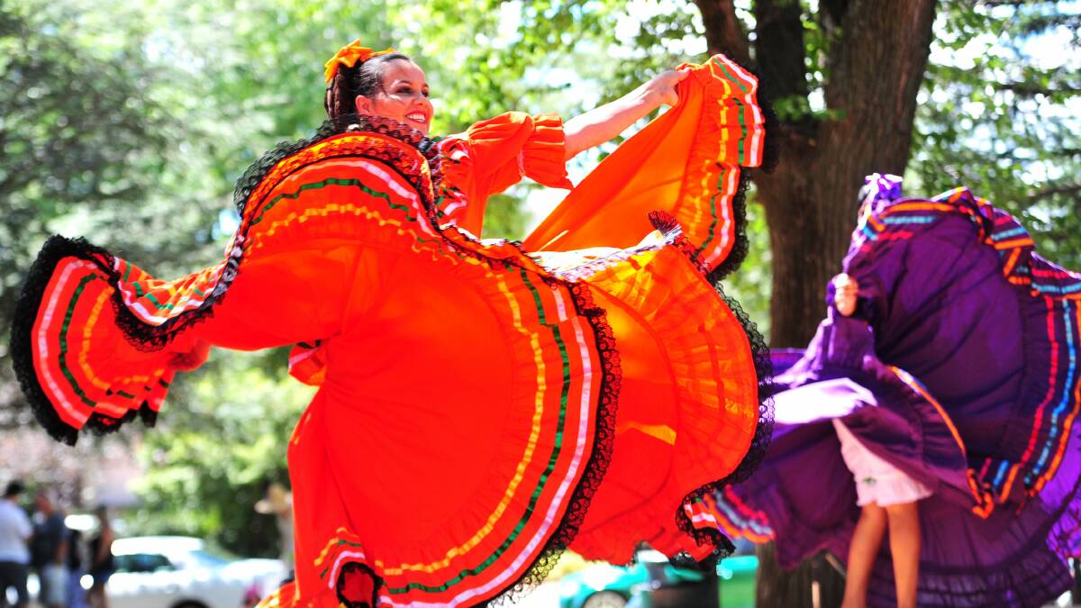 CARNIVALE TIME: Performing at the Queanbeyan Carnivale Multicultural Festival in 2016, are Rocio Escobar and Maria Mendez from the Mexico Lindo. Photo: Melissa Adams.
