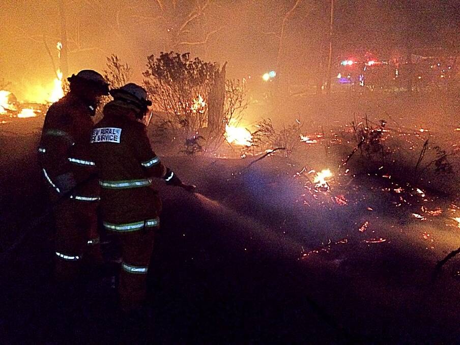 Queanbeyan firefighters battling the blaze. Photo: Facebook/ Queanbeyan City Rural Fire Brigade.