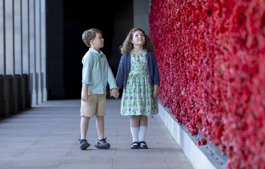 Lucas and Mathilda Berry reflect on the meaning of Anzac Day at the Australian War Memorial. Picture by Gary Ramage
