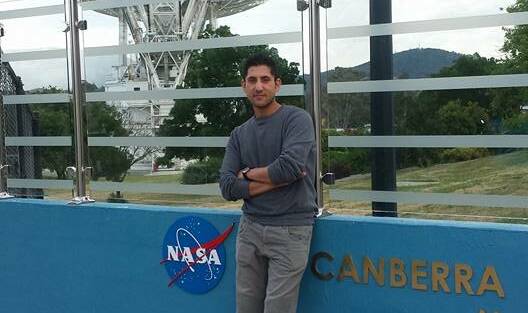 Akbar's father, uncle and best friend visited the Canberra Deep Space Communication Complex to record part of the tribute video they sent to his sick mother in Pakistan. Photo: Supplied