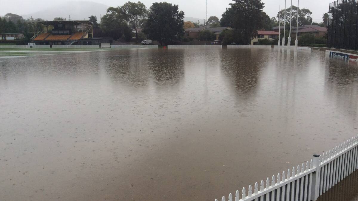 FOOTBALL FLOODING: The Queanbeyan Tigers players won't be doing any field drills Tuesday night. Photo: Michael Goiser.