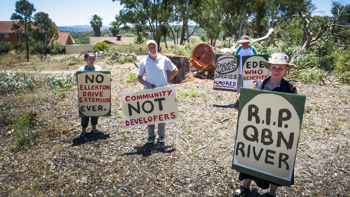 ELLERTON DRIVE EXTENSION: Felicity Gare of Karabar, Frank Briggs of Queanbeyan East, Annette Schneider of Burra and Asha Gare of Karabar are upset bulldozers are knocking down trees and termite nests to make way for new Edwin Land Parkway bypass. Photo Elesa Kurtz