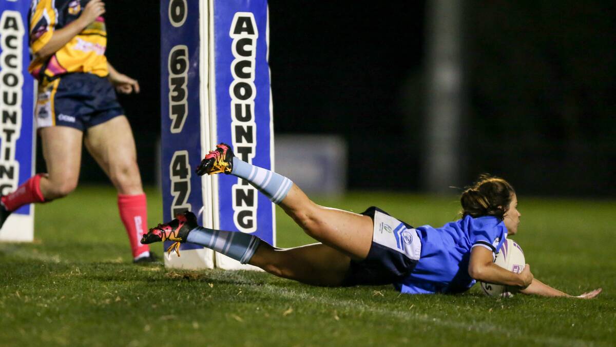 The Queanbeyan Blues won the first game of the Canberra Raiders Cup women's open tackle competition. Photo: Michael Thompson