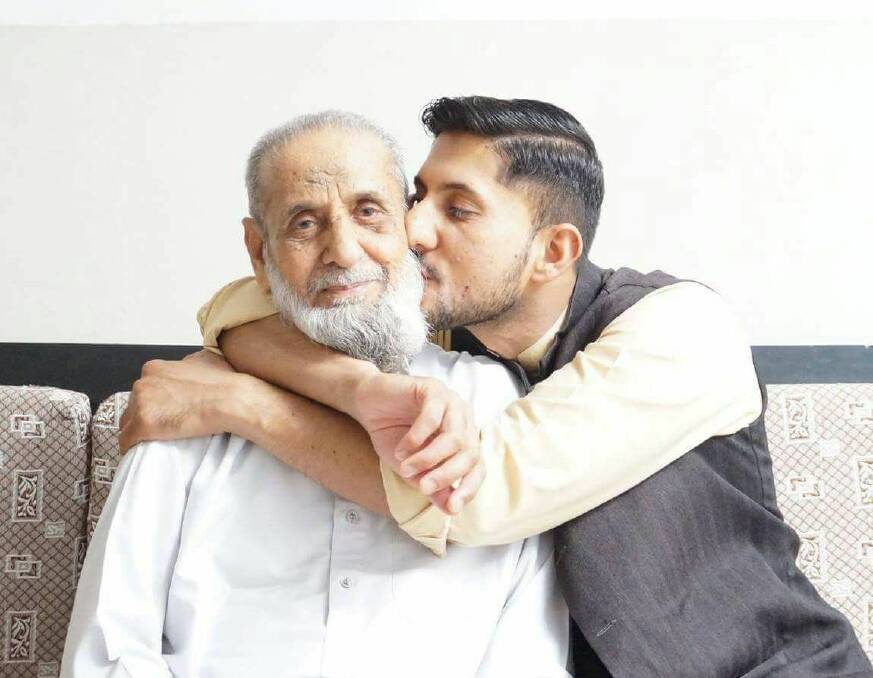 Mohammad Akbar Asabi and his son Zeeshan Akbar, who was stabbed to death in Queanbeyan in April. Photo: Supplied