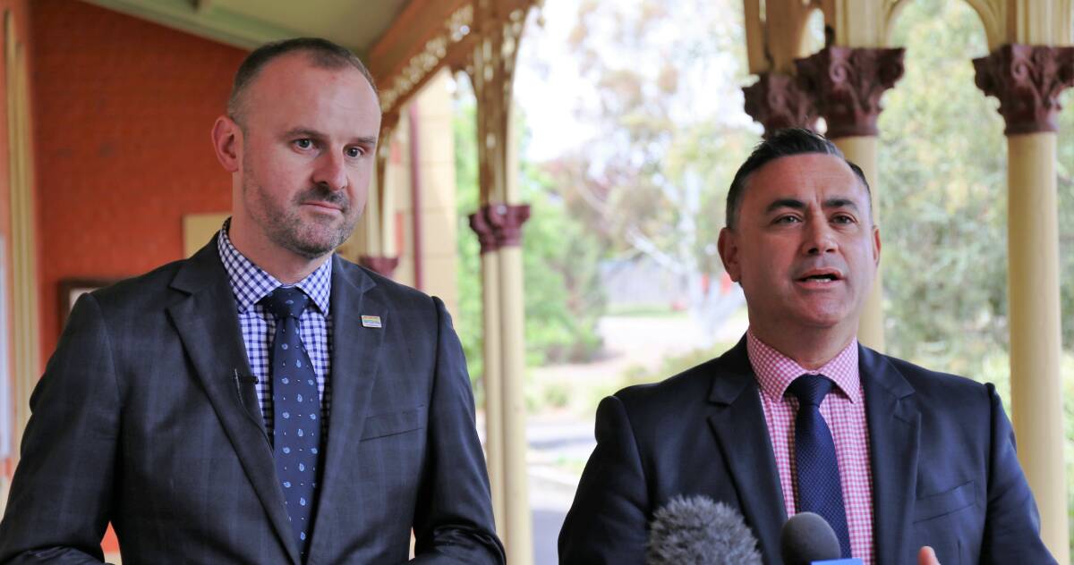 ACT Chief Minister Andrew Barr and NSW Deputy Premier John Barilaro announce a new memorandum of understanding at Queanbeyan Station. Photo: Supplied