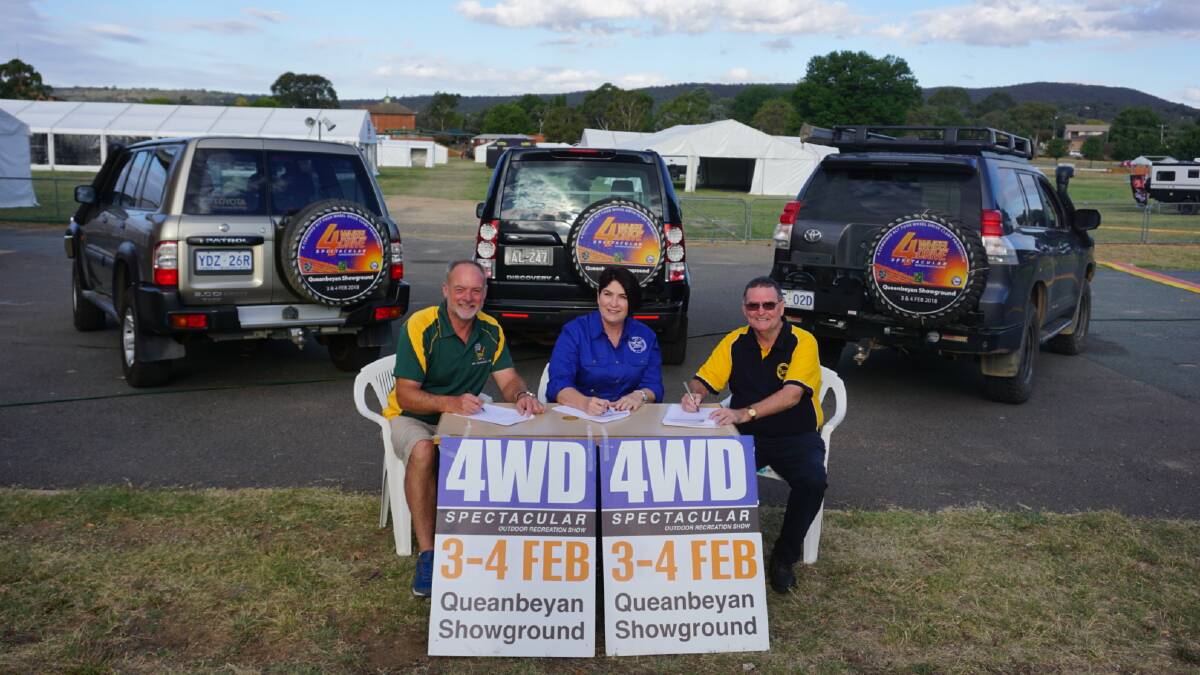 The presidents of the three four-wheel-drive clubs that host the 4WD Spectacular Andrew Lockley, Joy McGahey and Jim Anderson sign the MoU for three more shows. Photo: Supplied