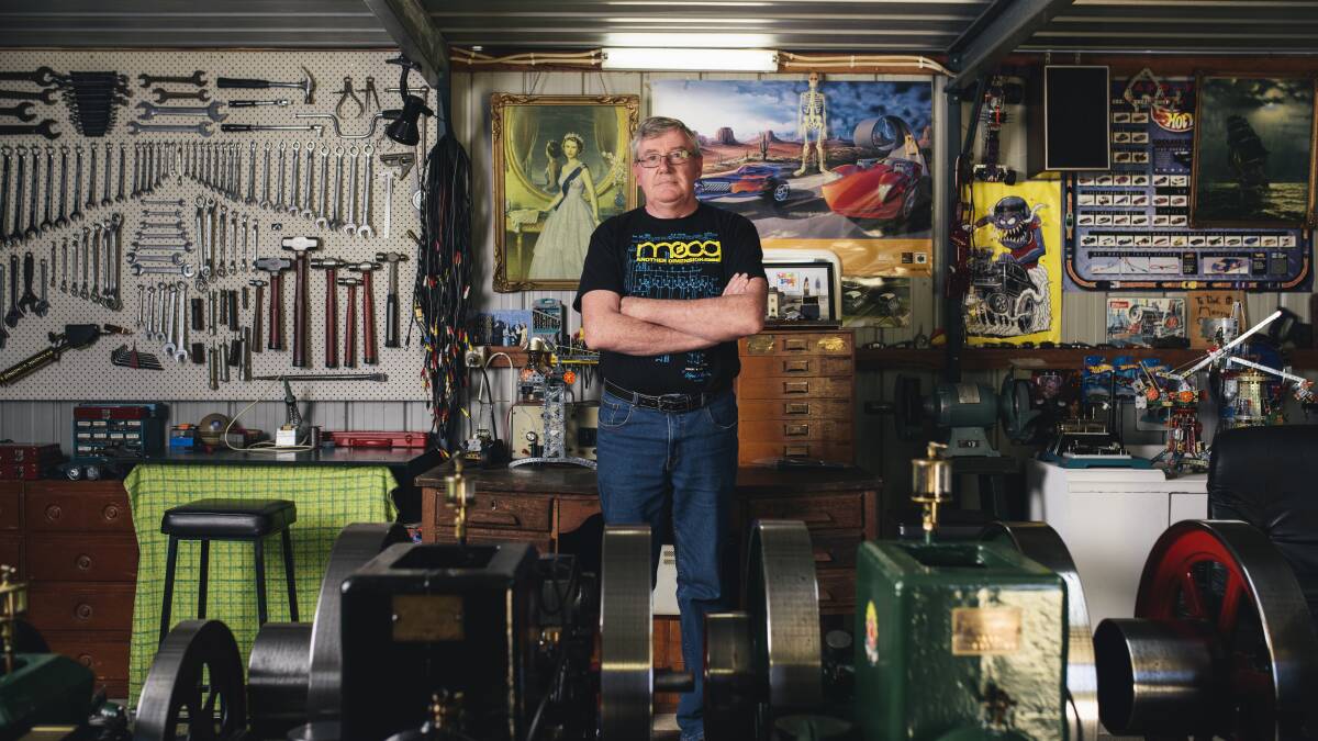 Chris Tregea in his shed at home in Queanbyean. He has been featured in a new book by Scott Cam, Scotty's Top Aussie Sheds. Photo: Rohan Thomson
