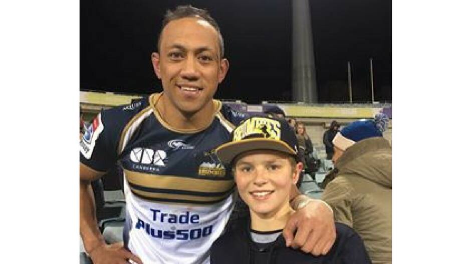Thomas 'TJ' Campagna is a keen rugby player, pictured here with Brumbies star Christian Lealiifano. Photo: Supplied