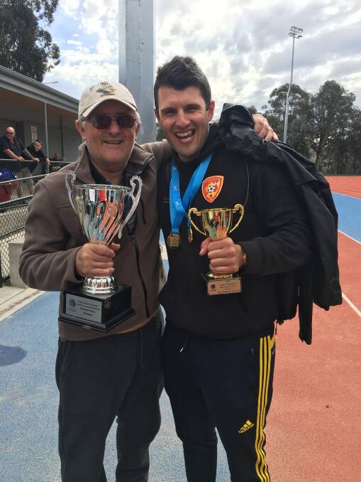 Coach Stephen Peios (right) said it was extra special to win in front of his dad Jim Peios (left) who played for Queanbeyan City in its inaugural season. Photo: Supplied