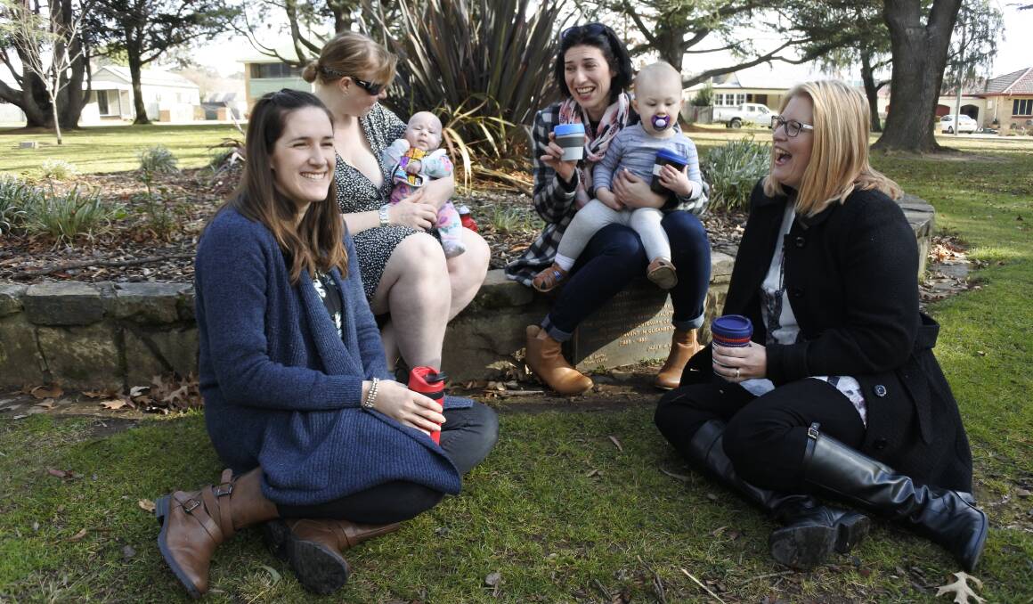 Re-usable cups? Check. Group founder Elyssa Carter enjoys coffee with Gabrielle Pusser with baby Laurelai and Seth (18 months), Lauren Baines and Elli Webb.