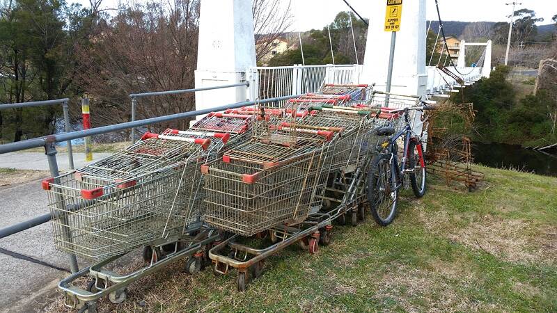 The 24 trolleys and bicycle removed from the Queanbeyan River. Photo: Supplied