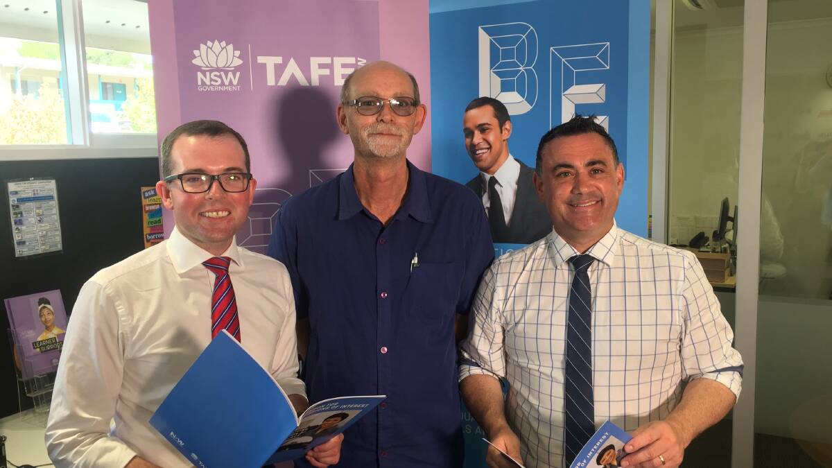 Aged-care announcement: Assistant Skills Minister Adam Marshall, aged-care student Peter Thorley and Deputy Premier John Barilaro at Queanbeyan TAFE. Photo: Andrew Brown
