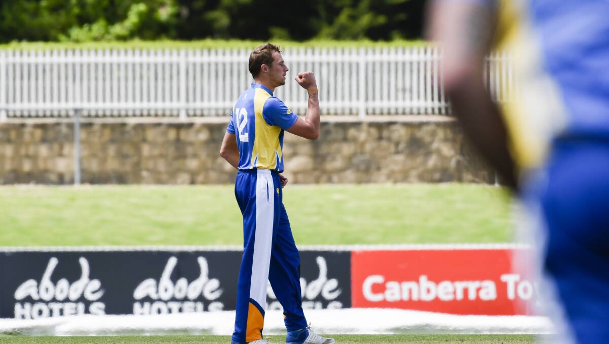 Celebration: Charlie Morris fist pumps after a catch off one of his balls. The ACT Aces only needed one win to advance to the Regional Bash semi-finals. Photo: Rohan Thomson