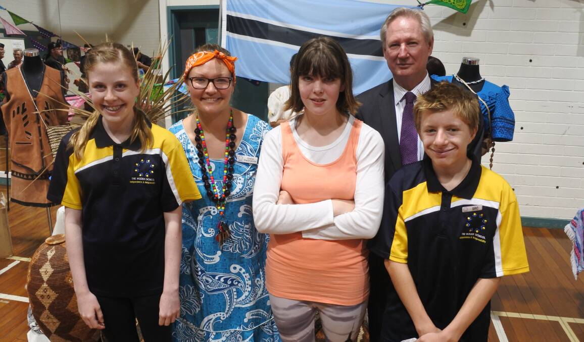 Celebrating culture: Students Genevieve Searson, Emily Fitzgibbons and Brock Hughes with teacher Sasha Matanalailai and principal Ian Copland. Picture: Andrew Brown