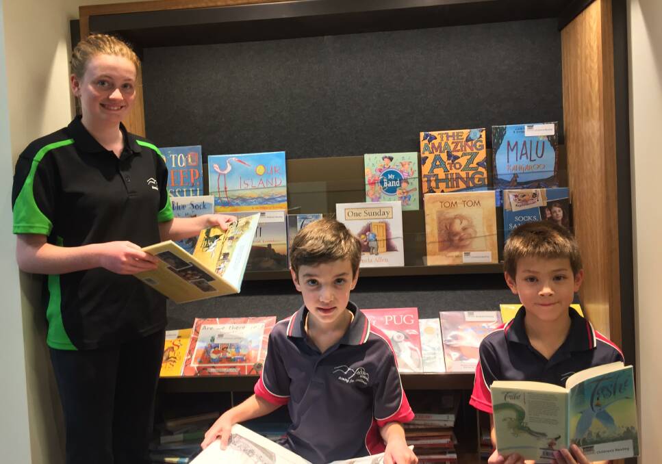 Page turners: Fadden Primary School students Annabelle Vial, Ryan Buttriss and Andrew Vincent, who were rewarded for their efforts in the Chief Minister's Reading Challenge. Photo: Andrew Brown