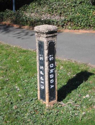 Street sign: A concrete signpost still in tact in Barton. Picture: Nick Swain