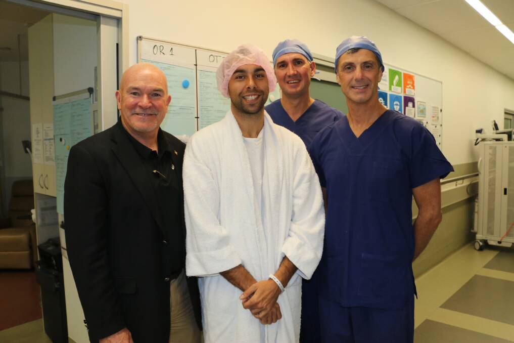 Barton Private Hospital: From the left, IMF founder Rob de Castella, IMF graduate Nat Heath, and podiatrists Dr Clayton Clews and Dr Damien Lafferty.