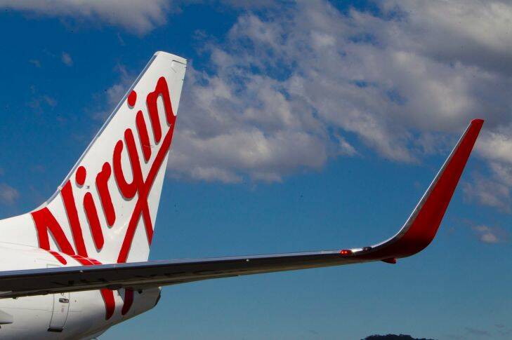 Virgin chief's pay takes off after getting cash under control