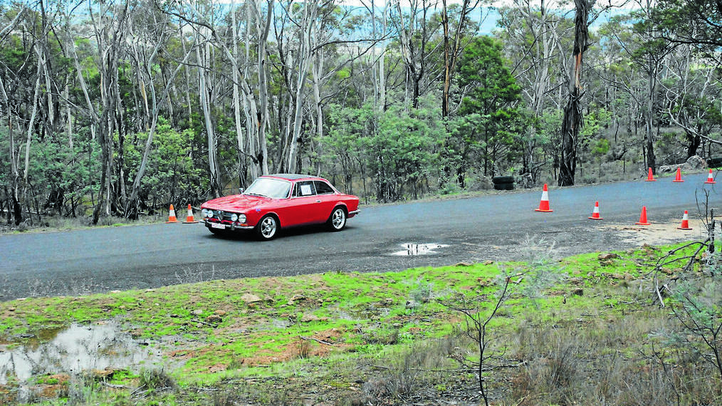COOMA: Local drivers shined in the second Mount Gladstone Hill Climb hosted by the Cooma Car Club on Sunday. David Crawford in his Alfa Romeo 105 powers up the hill.