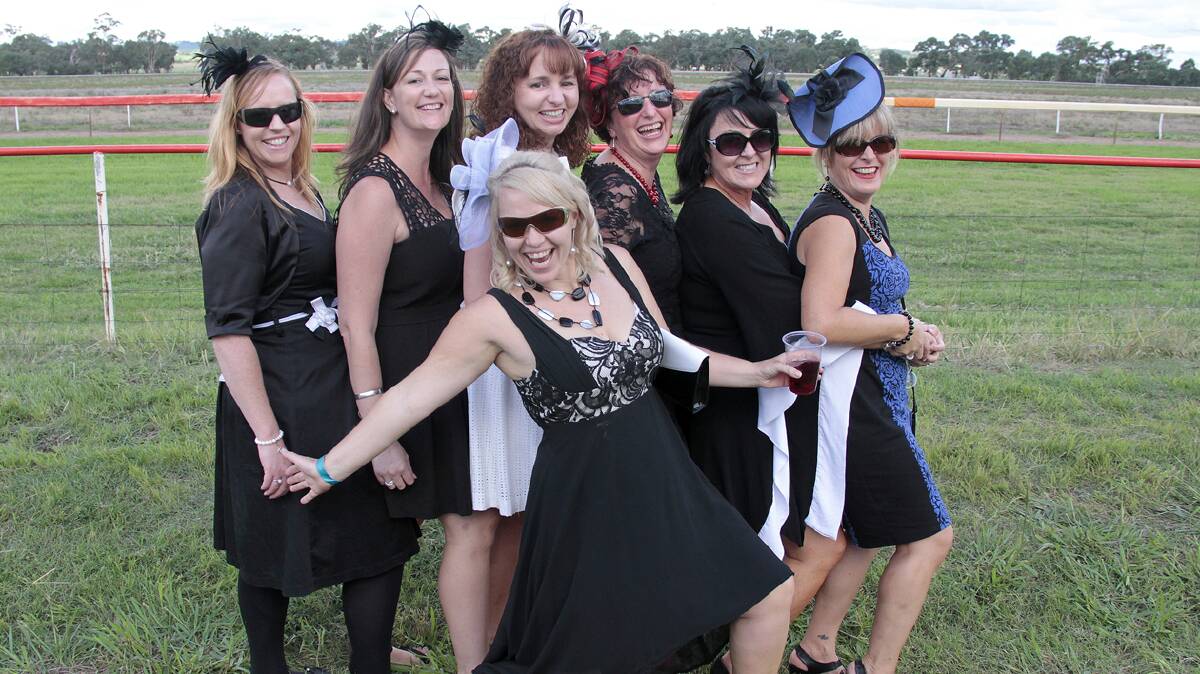 COOTAMUNDRA: Looking lovely - Enjoying a day at the Picnic Races on Saturday were (from left) Kylie Maluta of Canberra, Debbie-Jean Manning of Cootamundra, Tracey Pigram of Cootamundra, Kylie Annetts of Stockinbingal, Toni Jenkins of Cootamundra, Anita Morton of Stockinbingal and (front) Catherine Annetts of Cootamundra. Photo: Kelly Manwaring 