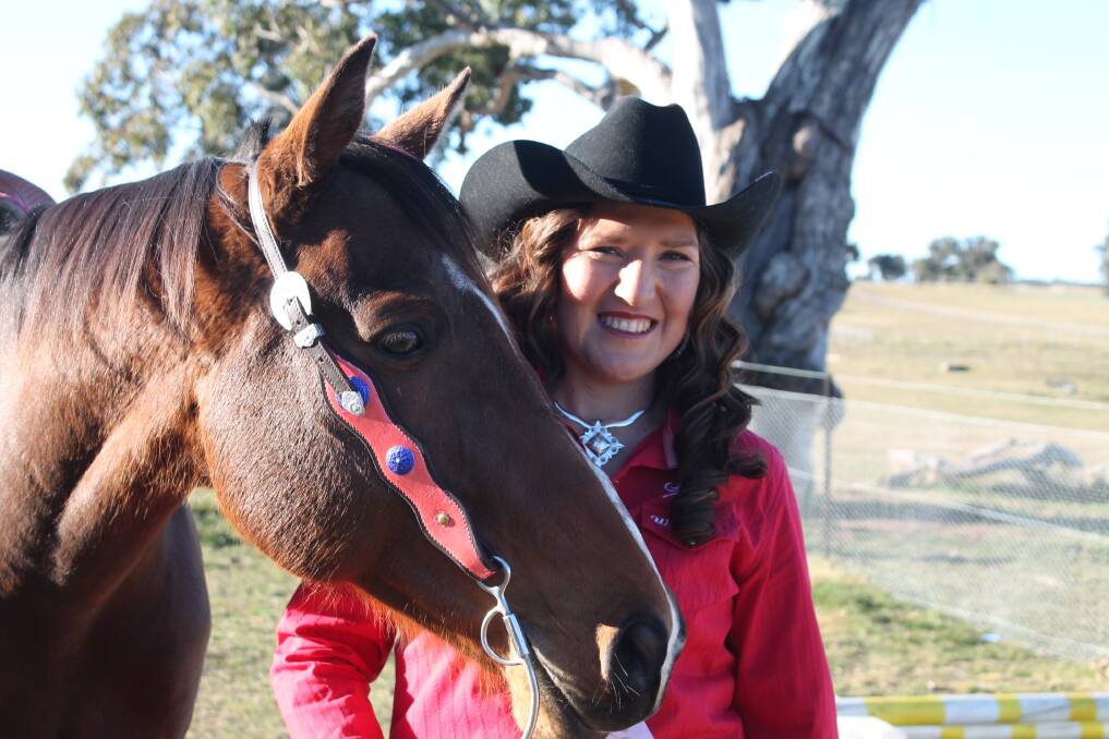 Local rodeo personality Simone Monaghan with her horse Charlie at her Bywong property. Photo: Joshua Matic.