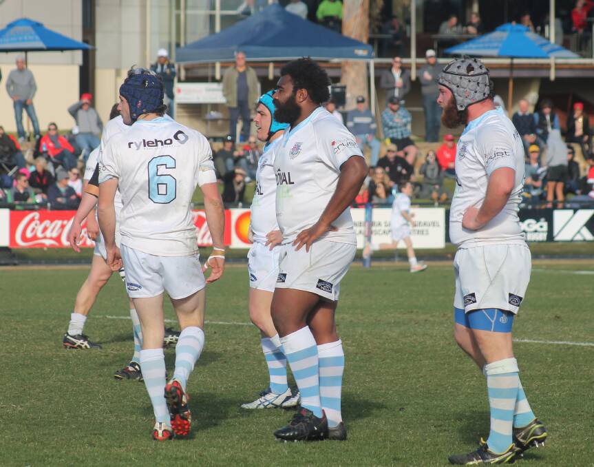 Queanbeyan Whites players look ahead in disappointment during their 25-13 grand final loss to the Tuggeranong Vikings last Saturday. Photo: Joshua Matic. 