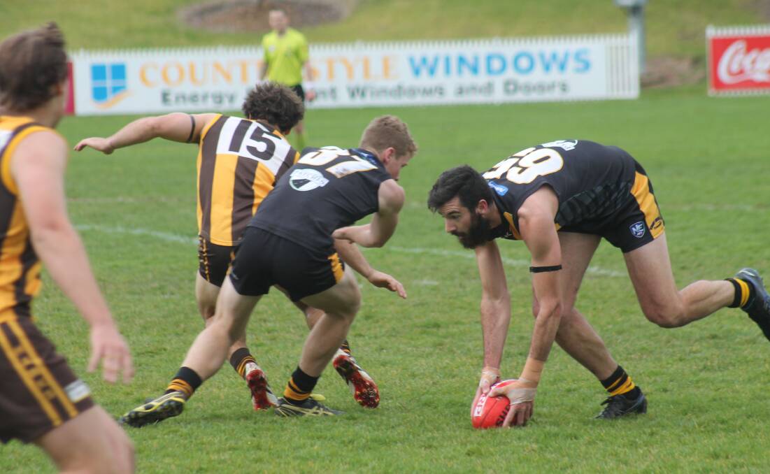 Highlights from AFL Canberra first grade round 11 action between the Queanbeyan Tigers and Tuggeranong Hawks at Dairy Farmers Park.