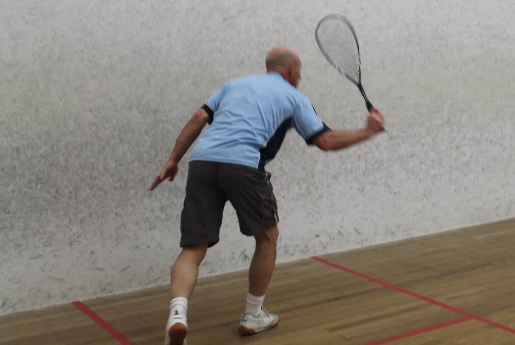 Queanbeyan Leagues Squash Club captain Shane Gurney plays a stroke against the Tuggeranong Vikings in the penultimate round of the ACT Autumn Pennant Series. Photo: Joshua Matic.