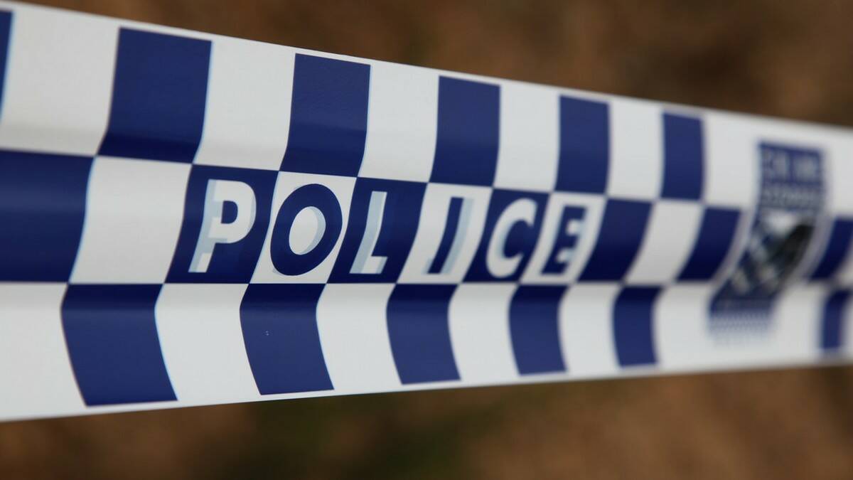 TRAPPED: A man was trapped for hours under a pallet at a workshop in Queanbeyan.