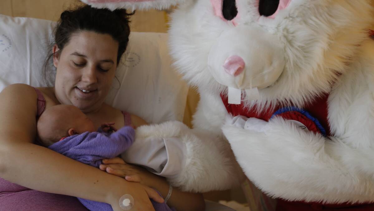 The Easter bunny said hello to Hannah Dyer and her new arrival, Aubrey Rees. Photo: Kim Pham.