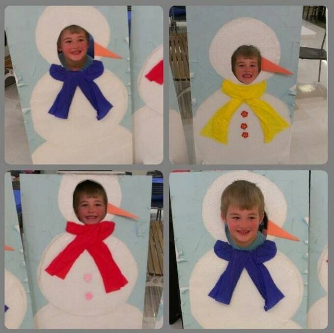 Local children have loved getting their photo taken with the snowmen cutouts at Riverside Plaza. Photo: Instagram / @margheff.