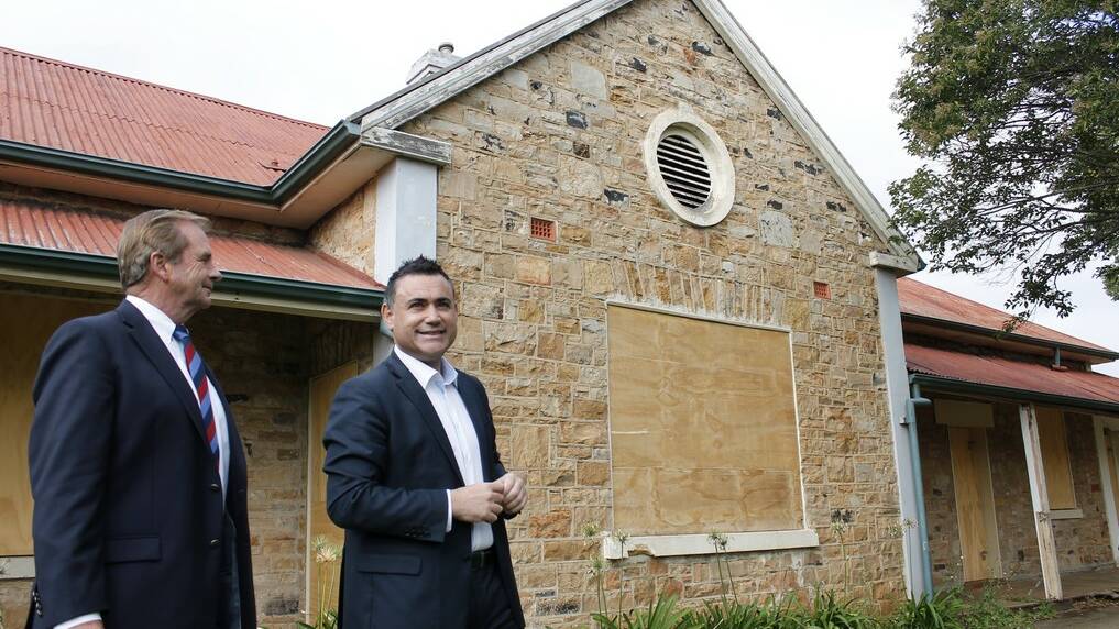 Queanbeyan Mayor Tim Overall and Member for Monaro John Barilaro outside Queanbeyan's heritage-listed former hospital, Rusten House.