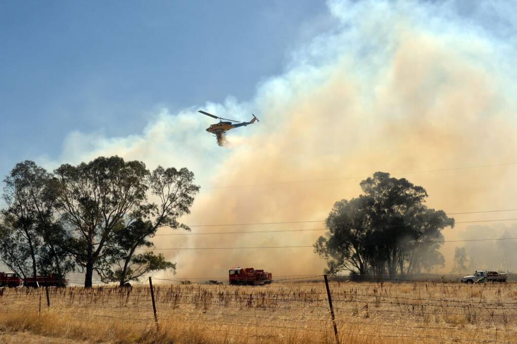 QUICK RESPONSE: Fire crews battled a fire in Maiden Gully. Picture: Brendan McCarthy.