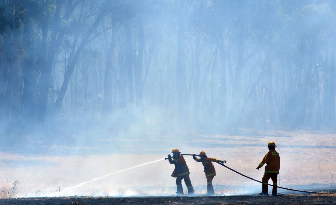 QUICK RESPONSE: Fire crews battled a fire in Maiden Gully. Picture: Brendan McCarthy.