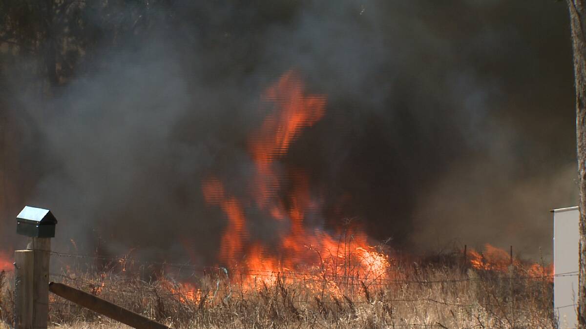 Firefighters battle a fire at Maiden Gully. Picture: APEX IMAGERY (CONTRIBUTED)