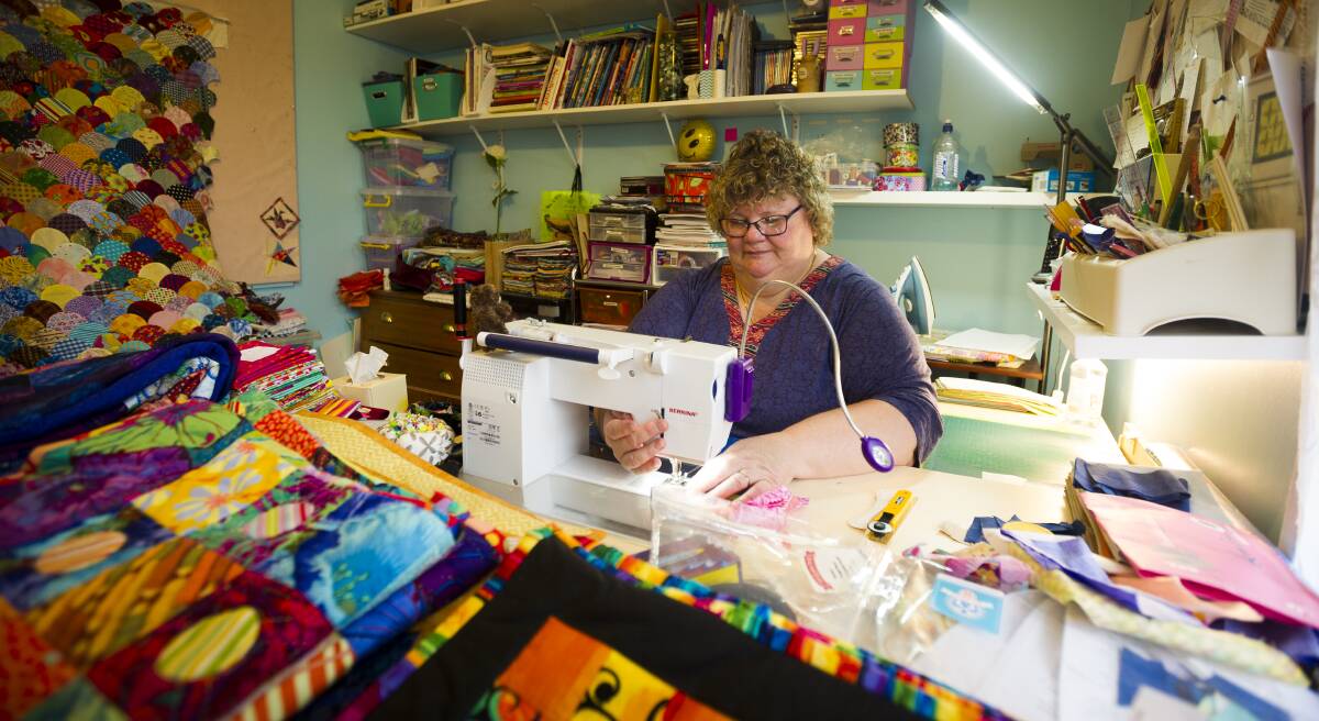 QUILT QUEEN: Wendy Luff in her quilting haven, several of Ms Luff's quilts will be on display at the Festival of Braidwood. Photo: Dion Georgopoulos.
