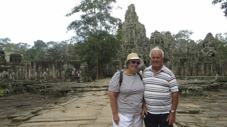 Inspiring ... Gwen Jones with her husband, Tom, at Bayon Temple, Angkor Wat. "The Angkor Wat complex is abosolutely huge and we went to a different section each day.''