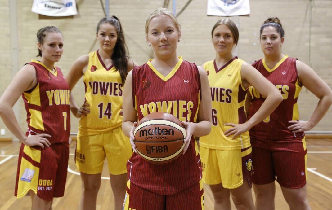 A lack of sponsors could see the Queanbeyan Yowies women's side forced to fold this season. Pictured: Yowies player Alison Macdonald (centre) with teammates Belinda Turk, Michaela Leonard, Kate Henry and Jasmine Henjak.