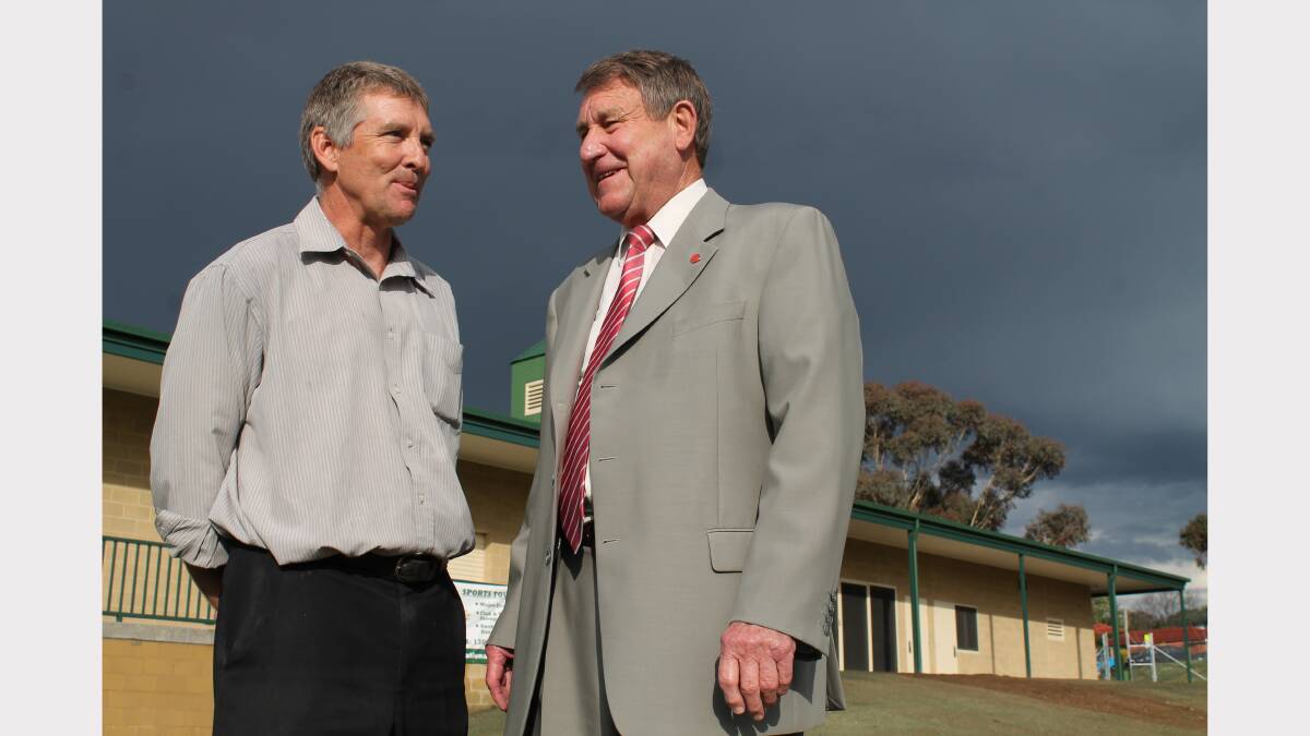 Queanbeyan cricket president Peter Solway and patron Ian McNamee outside the new $1.3 million Freebody Oval pavilion. Photo: Andrew Johnston