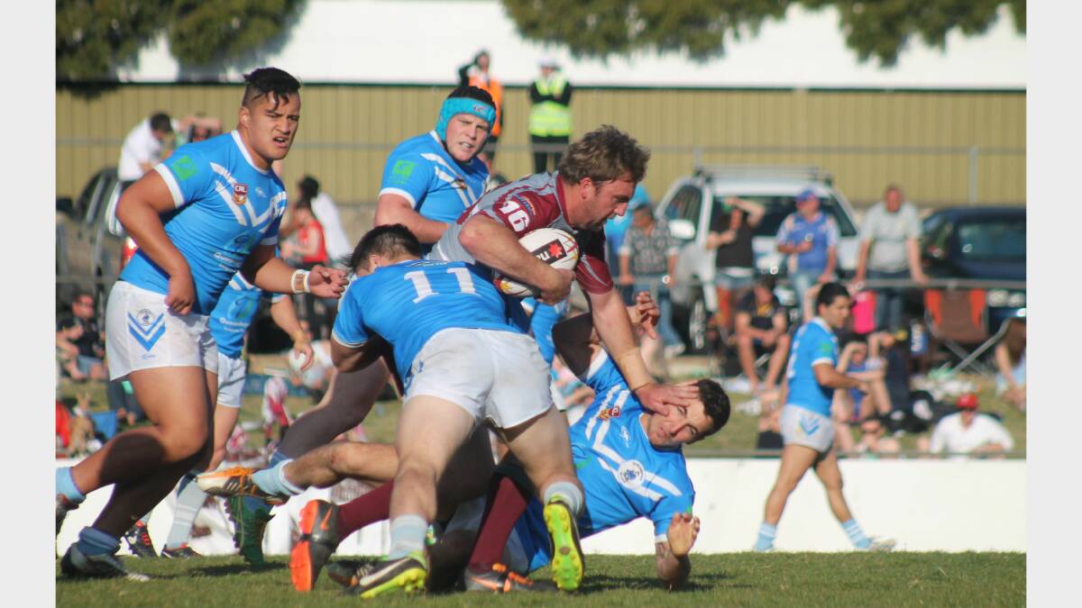 Coverage of the Queanbeyan Kangaroos grand final win over the Queanbeyan Blues attracted the most interest of any sport story on the Queanbeyan Age website in 2013. Photos: Andrew Johnston