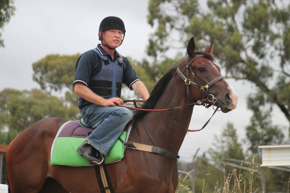 Trackwork rider Heath Parker puts General Explorer through his paces in work on Thursday morning. Photo: Andrew Johnston