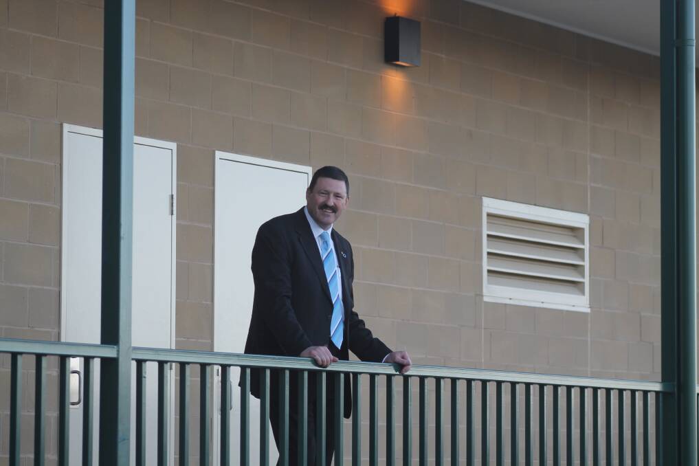 Federal Member for Eden Monaro stands on the balcony of the recently completed Freebody Oval pavilion. Photo: Andrew Johnston
