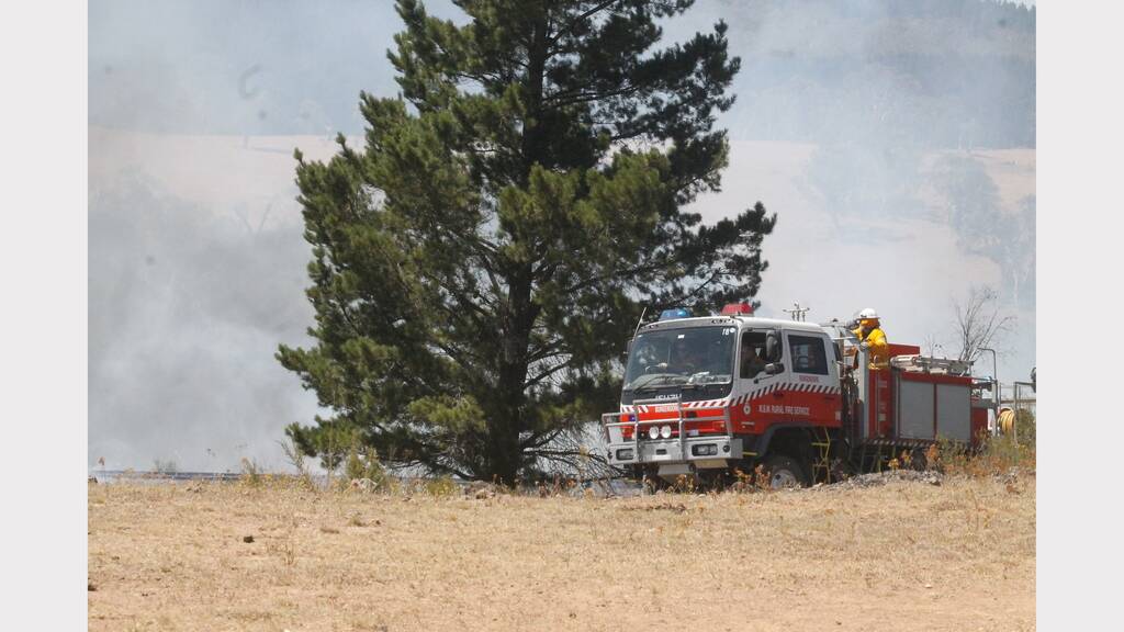 FIREFIGHTERS are battling a bushfire approximately five kilometres east of Queanbeyan on the fringe of Kowen Forest. (Photos: Kim Pham, Queanbeyan Age).