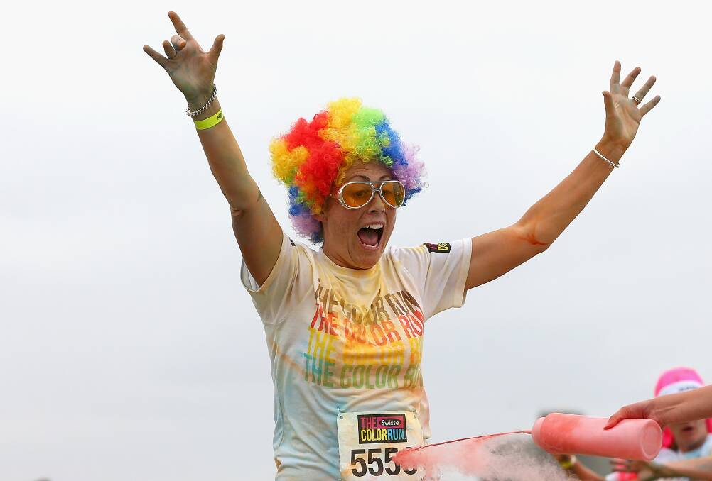 Competitors run through the colour stations during the Colour Run in Melbourne, Australia. Photo by Quinn Rooney/Getty Images